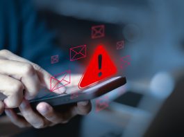 Hand over phone detecting a dangerous alert