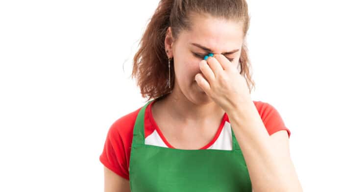 Stressed retail worker